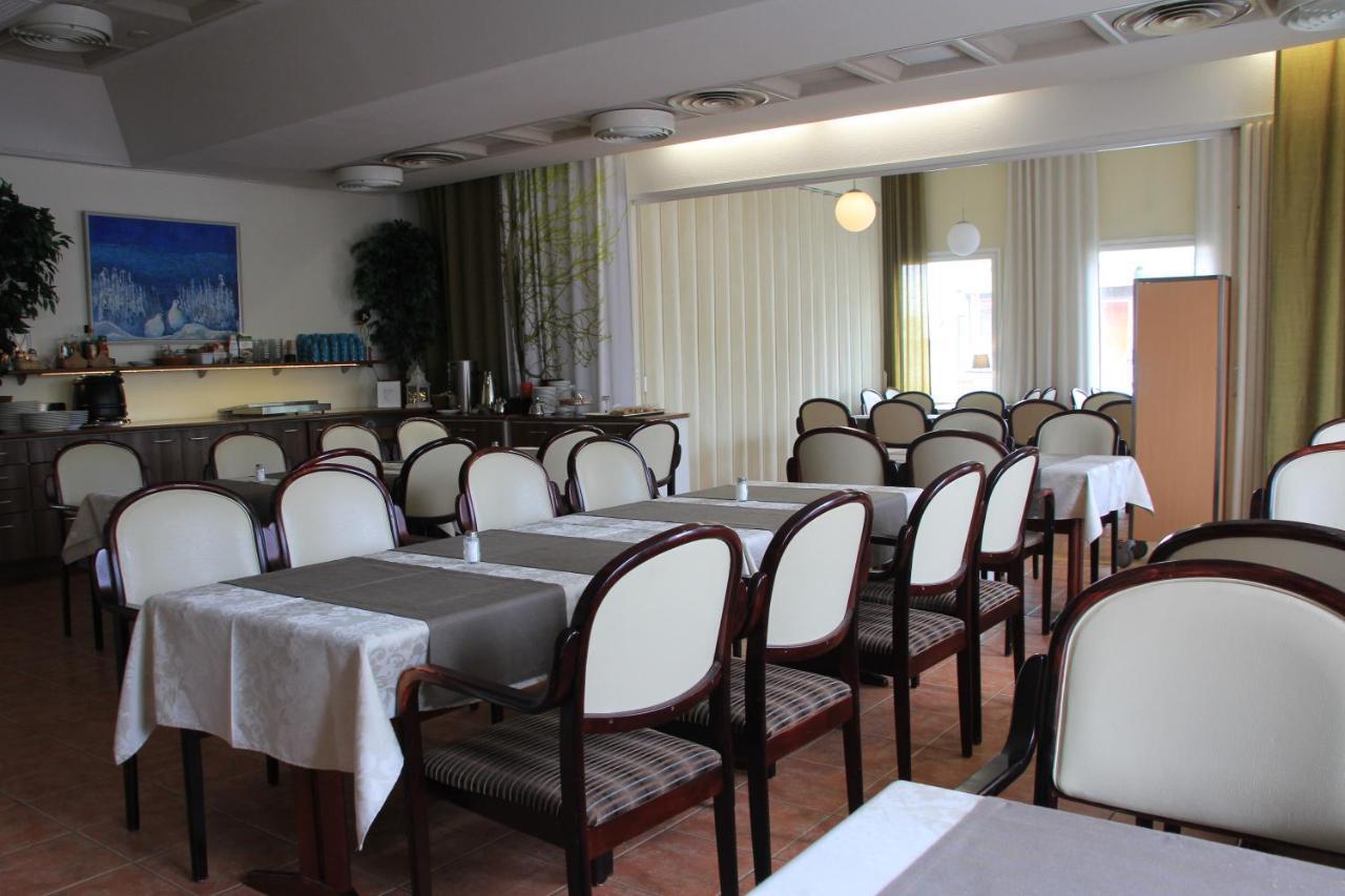 Hotel Aakenus โรวานิเอมิ ภายนอก รูปภาพ